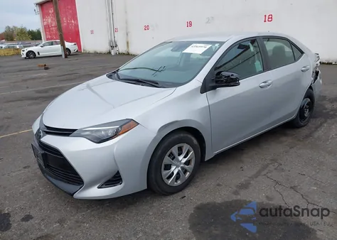 2017 Toyota Corolla L z USA, uszkodzony, nr VIN 5YFBURHE1HP695530